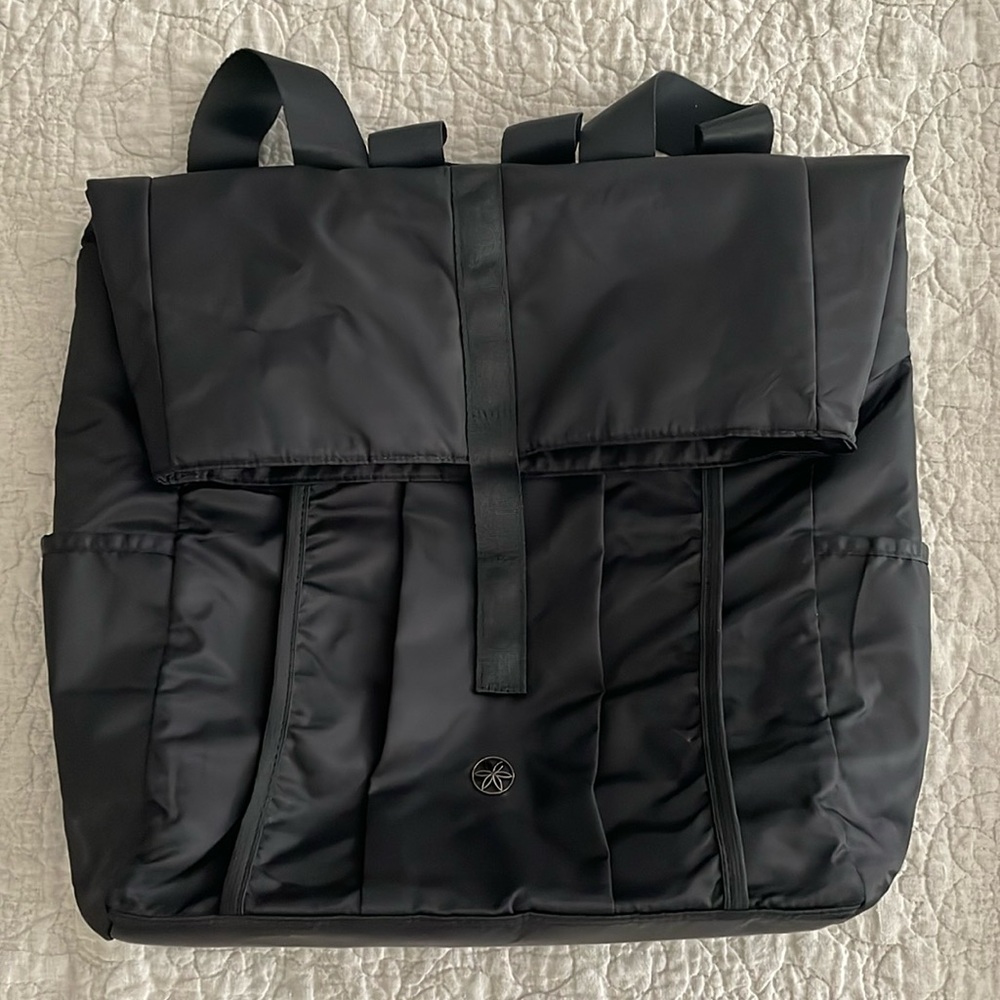 GAIAM yoga backpack/bag.  Black with grey interior.  Zip top, pocket for mat EUC